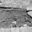 Jedburgh Abbey excavation archive
Frame 7: Area 2: Trench G: Middle of 400, with beginnings of drain 591, top right, viewed from N.

