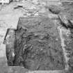 Excavation photograph : general shot of trial trench showing top of 19th century well to N of trench, looking NE.