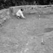 Excavation photograph : general view of area to W of ruins, showing rubble spread 106, 116, looking north.