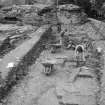 Excavation photograph : view of people working, looking west.