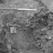 Excavation photograph : record shot of cut 603, fully excavated showing rubble 146 and dark soil 147, looking north.