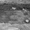 Excavation photograph : mortar and rubble, looking west.