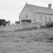 General view of Kiltearn Parish Church showing medieval buttresses.