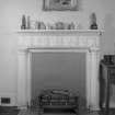Interior view of Cessnock Castle showing fireplace in small drawing room.