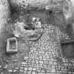 Craignethan Castle
Excavations 1984
Frame 18 - Interior of basement, showing cobbled floor, ash-pit, kiln and trough - from west
