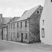 General view of E side of Back Wynd, Falkland, including the Haven.