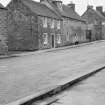 General view of buildings on the south side of Drummond Street, Muthill,