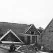 Braemar, Clunie Bank Road, Mill of Auchendryne.
General view with workmen working on roof.