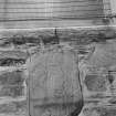 View of Rothiebrisbane Pictish symbol stone built into gable of  Fyvie Church.