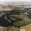 General oblique aerial view looking across the country house, stable, laundry, offices, museum and lake towards Coldstream and the River Tweed, taken from the WNW.