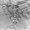 Oblique aerial view centred on the village of Stichill, taken from the ENE.