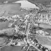 Oblique aerial view centred on town house from S.