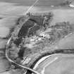 Oblique aerial view centred on country house from N.