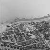 Oblique aerial view of Buckhaven centred on the Old Buckhaven housing redevelopment designed by Wheeler and Sproson in 1964-73, and recorded as part of the Wheeler and Sproson Project.  Taken from the NW.