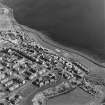 Oblique aerial view of Buckhaven centred on the Old Buckhaven housing redevelopment designed by Wheeler and Sproson in 1964-73, and recorded as part of the Wheeler and Sproson Project.  Taken from the WNW.