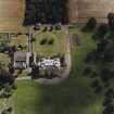 Oblique aerial view centred on the country house, garden, pavilions and lodges, taken from the NW.