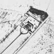 Oblique aerial view under snow, from E.
