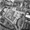 Oblique aerial view of Edinburgh centred on Fountainbridge, taken from the NW.
