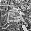 Oblique aerial view of Edinburgh centred on Fountainbridge, taken from WSW.