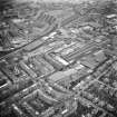 Oblique aerial view of Edinburgh centred on Fountainbridge, taken from the SSW.