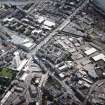 Oblique aerial view of Leith centred on the foot of Leith Walk and Great Junction Street, taken from the N.
