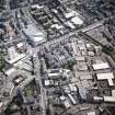 Oblique aerial view of Leith centred on the foot of Leith Walk and Great Junction Street, taken from the NW.