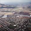 General oblique aerial view looking across Loanhead and the retail park towards Edinburgh, taken from the SE.