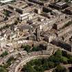 Oblique aerial view of Edinburgh centred on St Stephen's Church, taken from the SW.