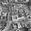 Oblique aerial view from West showing the Royal Infirmary and George Heriots Hospital School. Includes Chalmers Street.