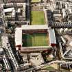 Oblique aerial view of Edinburgh centred on Tynecastle Park Stadium, taken from the ENE.