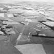 Oblique aerial view of East Fortune Airfield centred on the airfield, taken from the W.
