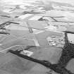 Oblique aerial view of East Fortune Airfield centred on the airfield, taken from the SW.
