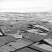 Oblique aerial view of East Fortune Airfield centred on the airfield, taken from the ESE.