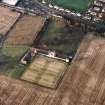 Oblique aerial view of Prestonpans, Johnnie Cope's Road, Bankton House centred on a country house, taken from SE.