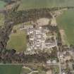 Oblique aerial view centred on the hospital, taken from the SSE.