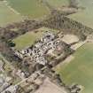 Oblique aerial view centred on the hospital, taken from the E.