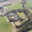 Oblique aerial view centred on the hospital, taken from the N.