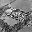 Oblique aerial view centred on the hospital, taken from the SSW.