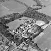 Oblique aerial view centred on the hospital, taken from the E.