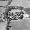 Oblique aerial view centred on the hospital, taken from the ENE.