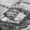 Oblique aerial view centred on the hospital, taken from the WNW.