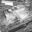 Aerial view of Brunton Ltd wire works, excavation and River Esk bridges, taken from the NE.