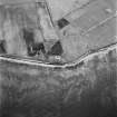 Hoy, Crockness, oblique aerial view, taken from the ENE, centred on the Martello Tower. A curving linear soilmark is visible in the top left hand corner of the photograph.