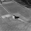 Oblique aerial view centred on Martello tower from SE.