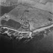 Hackness, oblique aerial view, taken from the NE, centred on The Battery, with the  Martello Tower shown in the centre left of the photograph.