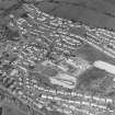 Oblique aerial view of Kilsyth centred in the school, taken from the SE.