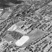 Oblique aerial view of Kilsyth centred in the school, taken from the NE.