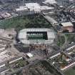 Glasgow, Parkhead, oblique aerial view, taken from the SW, centred on Celtic Park football stadium, and showing the Eastern Necropolis graveyard in the top half of the photograph.