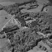 Aerial view of Loudoun Castle, gardens, estate policies and fairground, taken from the SE.