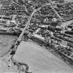 Aerial view of Galston road bridge, Church Lane Lace Mill, Barr Castle, and Bentinck Street Church, taken from NNE.